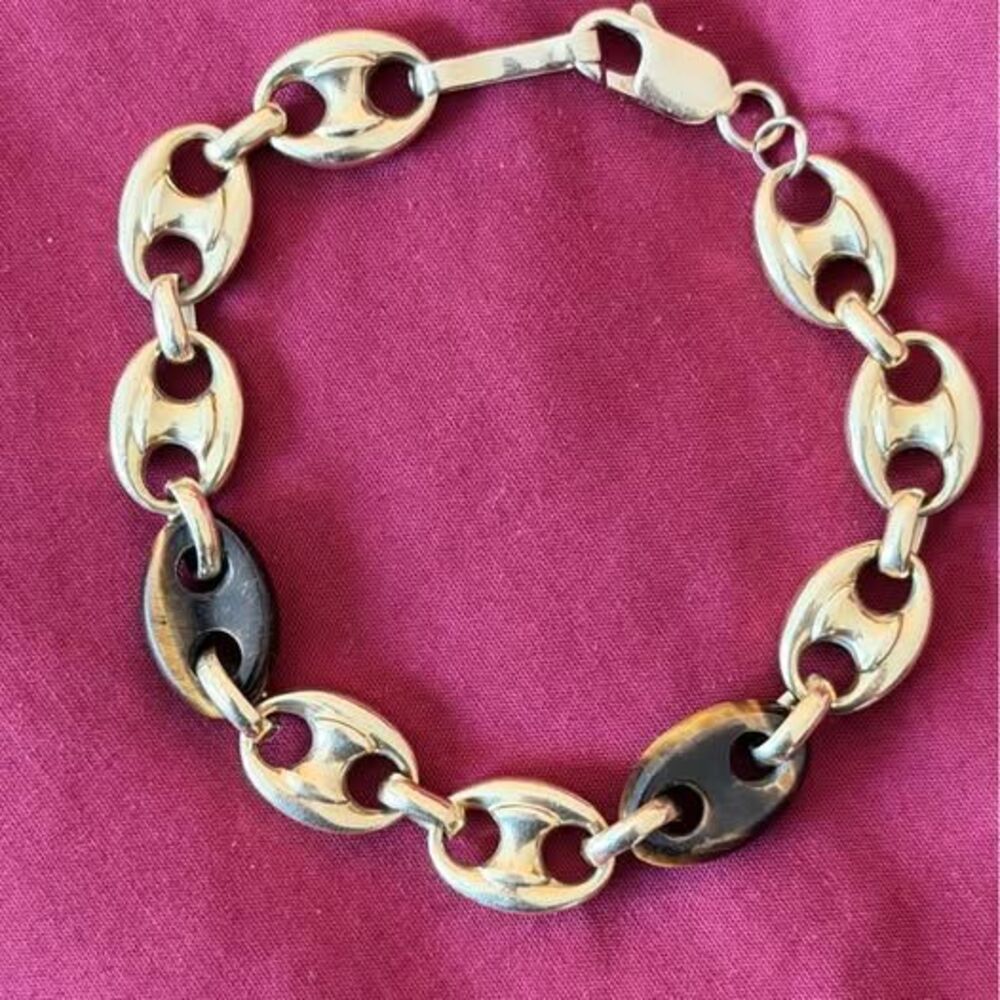 es:
Italian Onyx 14K 24.9Grams Gold "Gucci" Style Bracelet